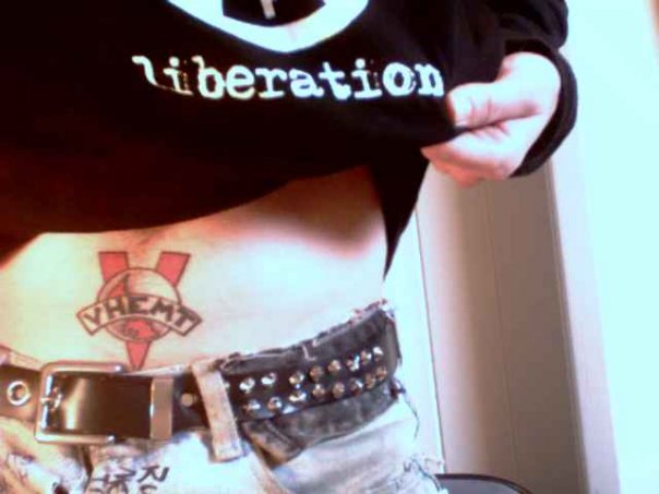 Tummy logo tattoo